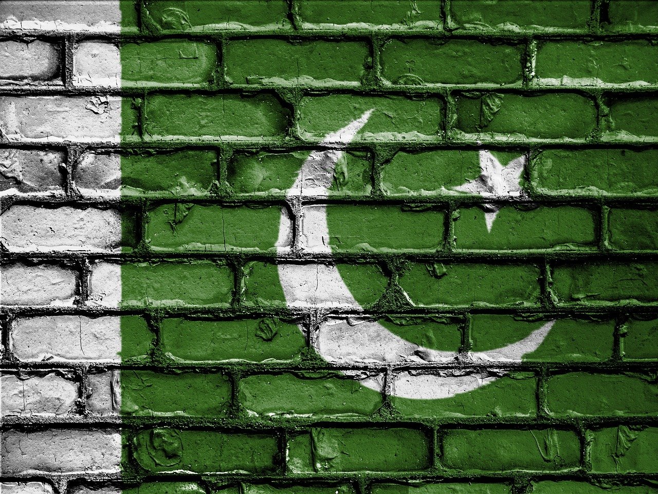 Pakistan flag painted on brick wall